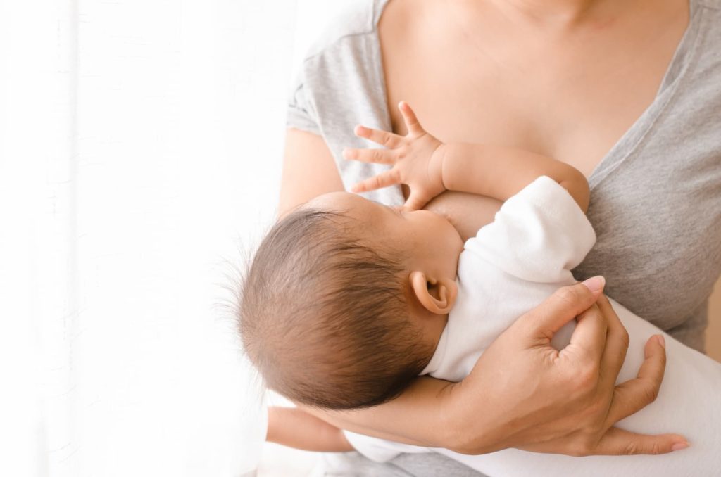 Woman breastfeeding her baby